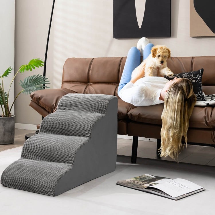 Gray 4-tier foam dog steps with non-slip surface, designed for easy pet access to sofas and beds.